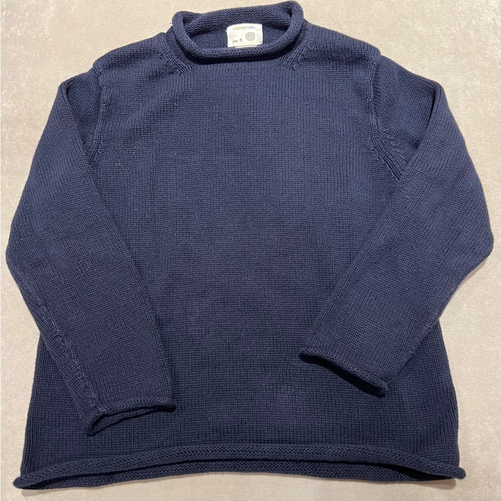 Boys Crewcuts navy roll neck sweater.